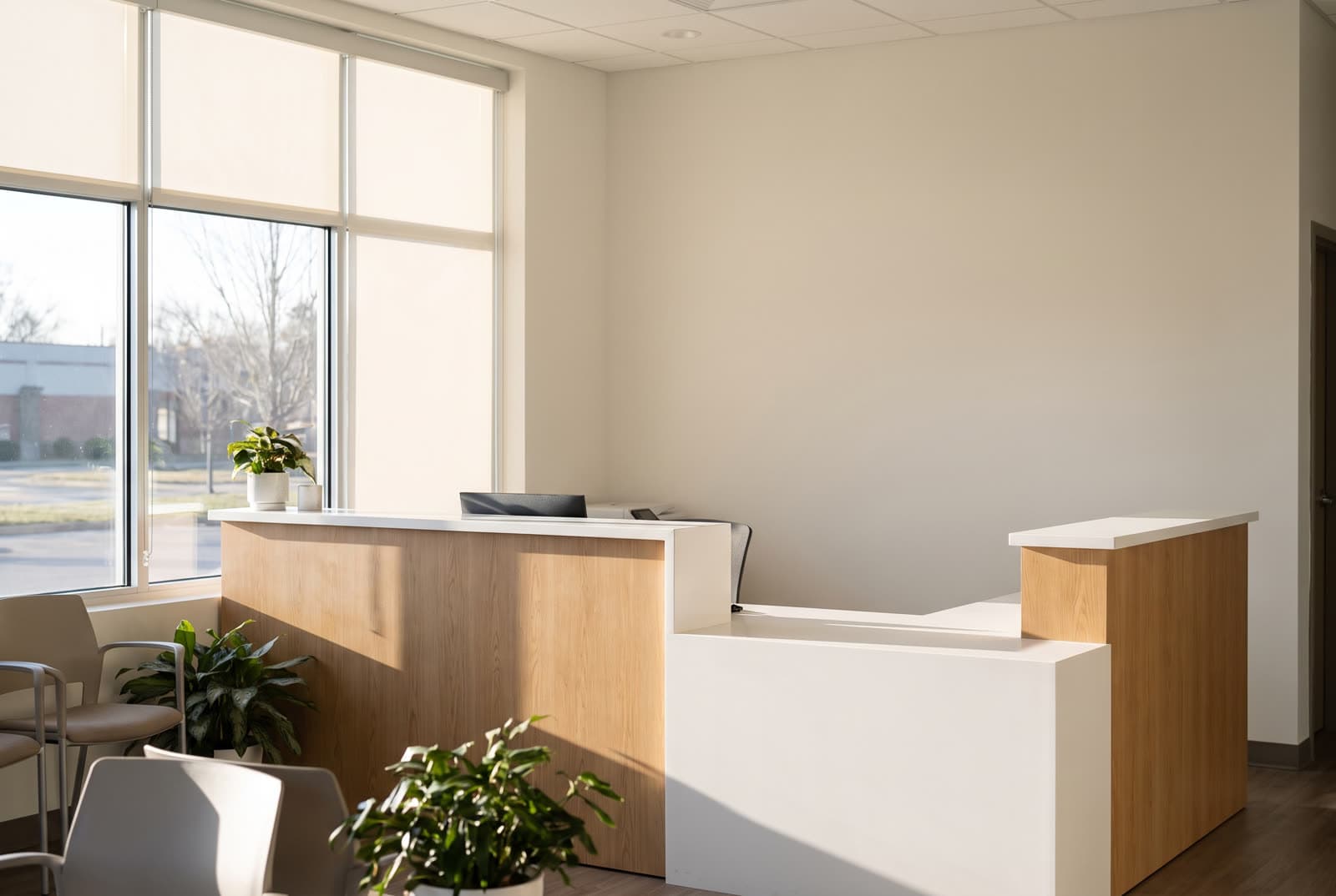 Empty urgent care reception counter in early morning light